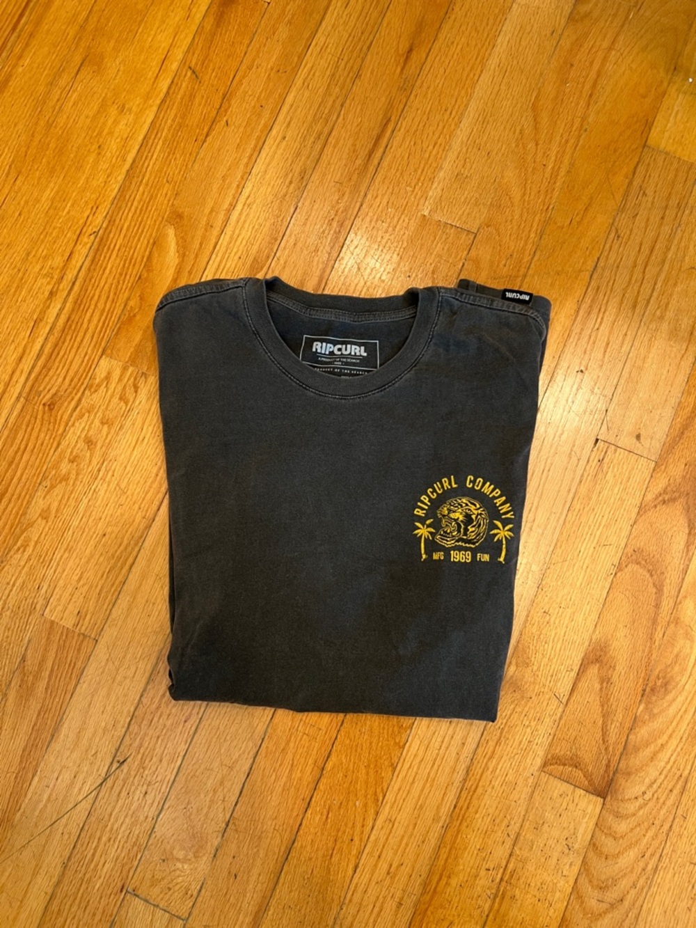 Rip Curl Black Short Sleeve Tee with Yellow Chest Graphic